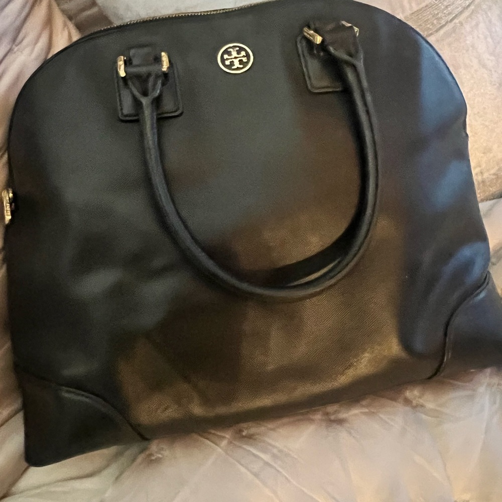 Tory Burch bowler bag in black. Gently used and in good condition.